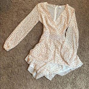 Brown and tan polka dotted romper.